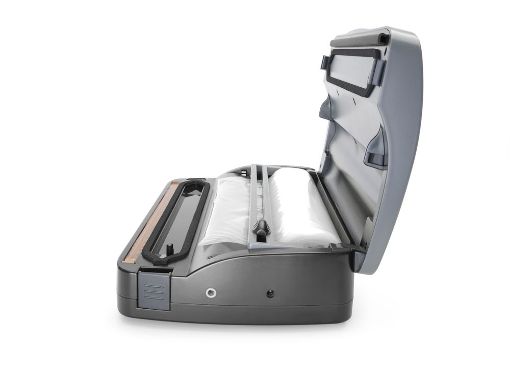 Vacuüm verpakkingsmachine voor zakken op rol.