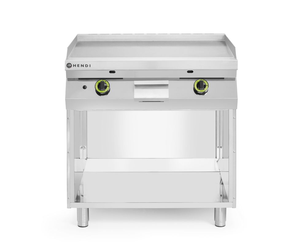 Gladde gasgrillplaat gemonteerd op een onderkast, gesloten aan drie zijden